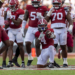 Alabama running back Daniel Hill (4) signals first down after his run against Florida State during the first half of an NCAA college football game Saturday, Sept. 19, 2026, in Tuscaloosa, Ala. (AP Photo/Vasha Hunt)